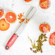 Microplane | Premium Zester, Grater - Lipstick Pink with grated zest, pistachios, and grapefruit sorbet, showcasing its precision and versatility for culinary enthusiasts.