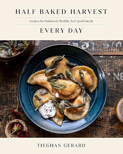 Cover of Half Baked Harvest Every Day cookbook by Tieghan Gerard, featuring ravioli in browned butter, highlighting balanced, feel-good meals.