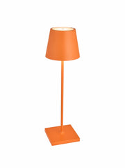 Zafferano America - Poldina Pro Cordless Lamp: Rust with a minimalist design, featuring a touch-activated, dimmable LED light on a slender stem and square base.
