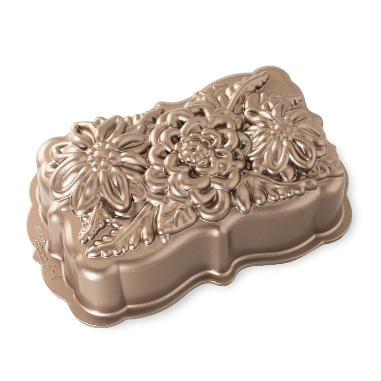Nordic Ware | Wildflower Loaf Pan showcasing intricate fern and floral designs, ideal for baking elegant loaves with a premium nonstick surface for easy release.