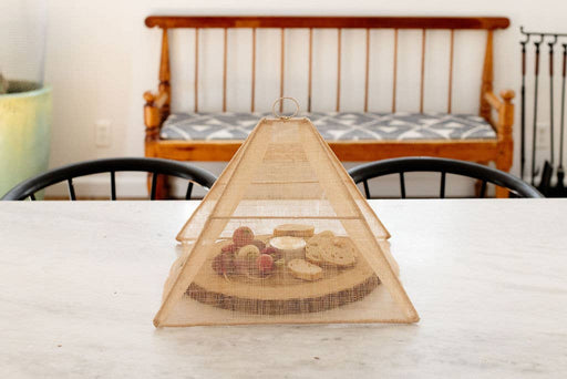 NEEPA HUT - Handmade Collapsible Woven Food Tent with a unique pentagon shape, ideal for outdoor dining, crafted from Abaca by Filipino artisans.