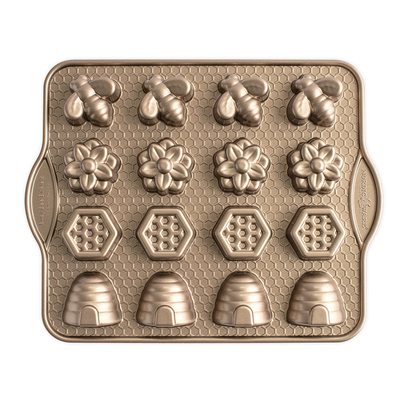 Nordic Ware | Busy Bee Bitelet Pan with 16 bee and flower-shaped cavities for creating festive, bite-sized treats, ideal for spring and summer gatherings.