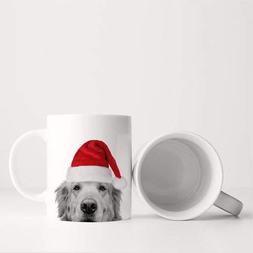 Perkie Prints - Santa Hat Golden Retriever 1 Mug: Two ceramic mugs, one upright with a Golden Retriever in a Santa hat, perfect for festive kitchen moments.