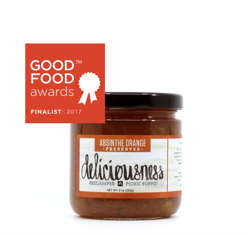 RedCamper Absinthe Orange Deliciousness Marmalade 9 oz jar, ideal for cheeseboards, blends organic citrus with absinthe, offering a sophisticated, versatile flavor perfect for gourmet pairings.
