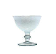 Arte Italica & Crown Linen Designs - Rialto Compote: Tuscan White, showcasing a clear, mouth-blown glass with a white swirled, marbled rim, perfect for elegant dining.