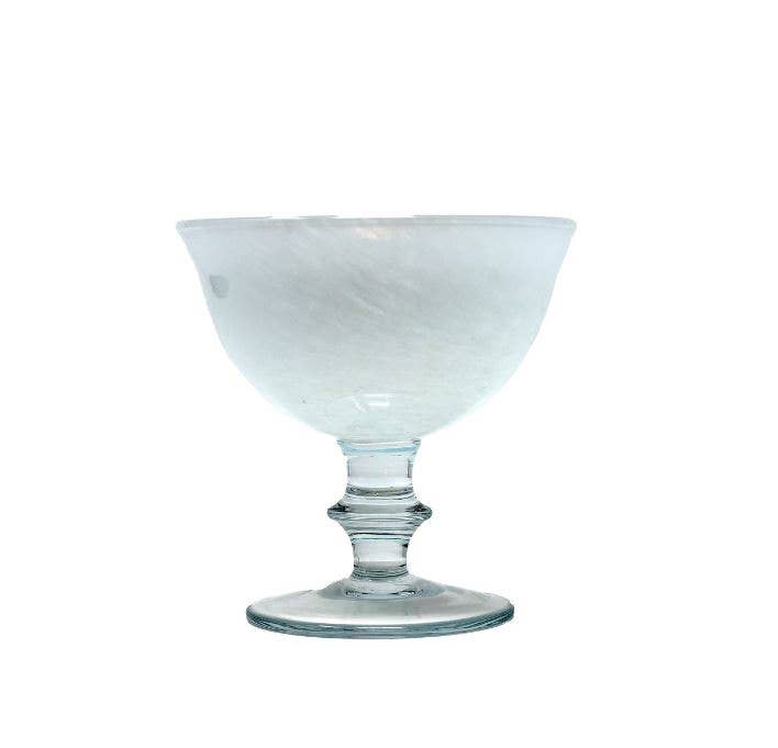Arte Italica & Crown Linen Designs - Rialto Compote: Tuscan White, showcasing a clear, mouth-blown glass with a white swirled, marbled rim, perfect for elegant dining.