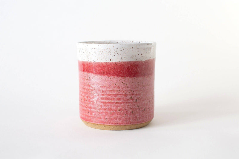 RachaelPots - Kitchen Utensil Holder: Sage, a hand-thrown stoneware vessel with a pink-red glaze, white speckled rim, perfect for organizing kitchen utensils.