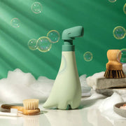 OTOTO - Soapasaurus soap dispenser with floating bubbles and a wooden brush, adding whimsical fun to handwashing.