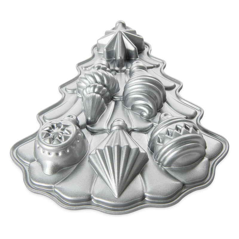 Nordic Ware Vintage Ornament Cakelet Pan, a silver Christmas tree-shaped mold, perfect for crafting festive, intricate holiday desserts with ease and elegance.