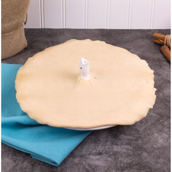 Harold Imports | Pie Bird on pie crust, enhancing steam release during baking, styled on a kitchen setting plate.