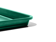 Great Jones | Little Sheet - Pepper, a compact nonstick baking tray, ideal for small ovens and personal servings, showcased in a close-up image.