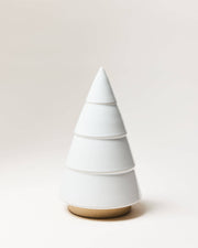 Farmhouse Pottery - Balsam Woodland Trees: Medium, a minimalist ceramic tree-shaped sculpture, perfect for year-round decor, featuring stacked, tapering cones on a tan base.