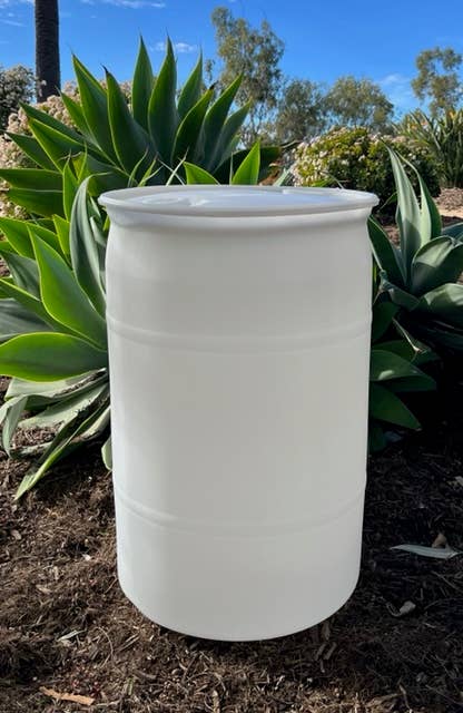 Root and Splendor - Bulk Stain Remover in a plain white barrel outdoors, ideal for eco-friendly, refillable cleaning solutions.