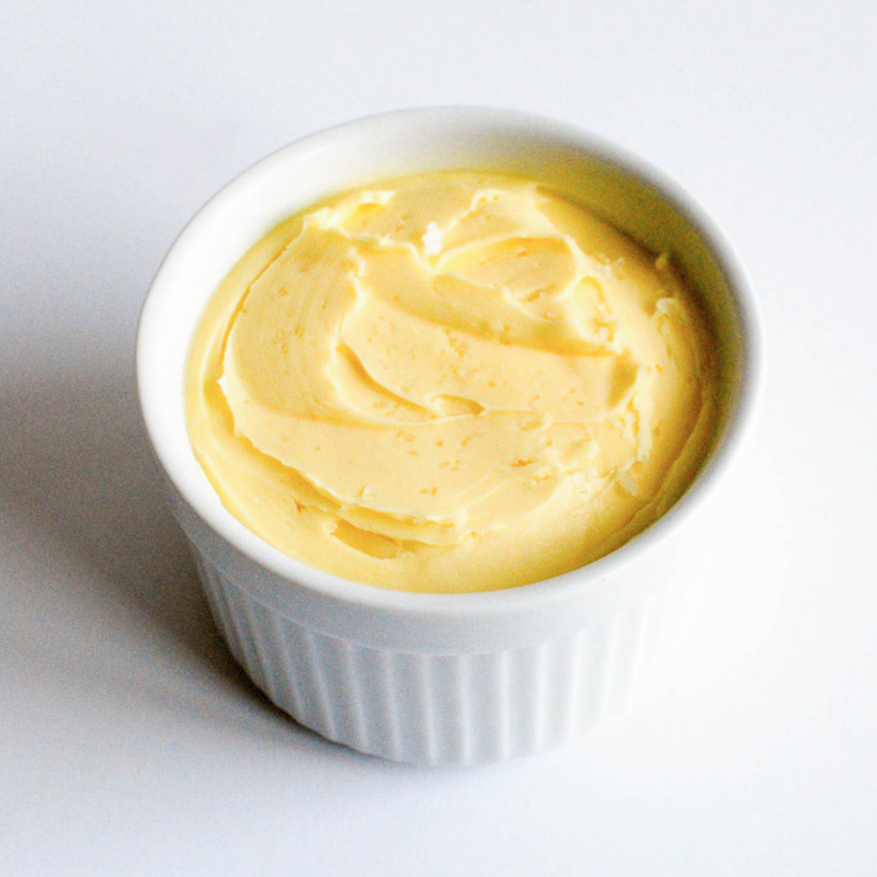 Banner Butter | Sea Salt - 5 oz in a white bowl; small-batch cultured butter infused with cold-smoked hickory sea salt for a savory, smoky flavor.