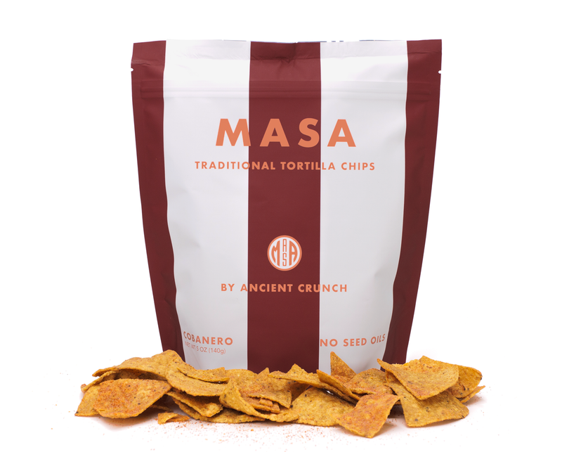 Ancient Crunch | Masa Traditional Tortilla Chips, Cobanero flavor in a 5 oz pouch with seasoned chips in front, ideal for culinary enthusiasts at Athens Cooks.