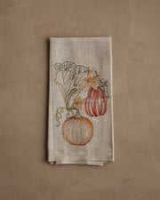 Coral & Tusk - Pumpkin Vine Tea Towel features embroidered pumpkins and vines, perfect for autumn kitchen decor. Measures 25 × 18 unfolded.