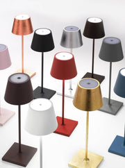 Zafferano America - Poldina Pro Cordless Lamp: Rust, featuring a sleek design with a tapered shade, slim stem, and square base, ideal for modern spaces.