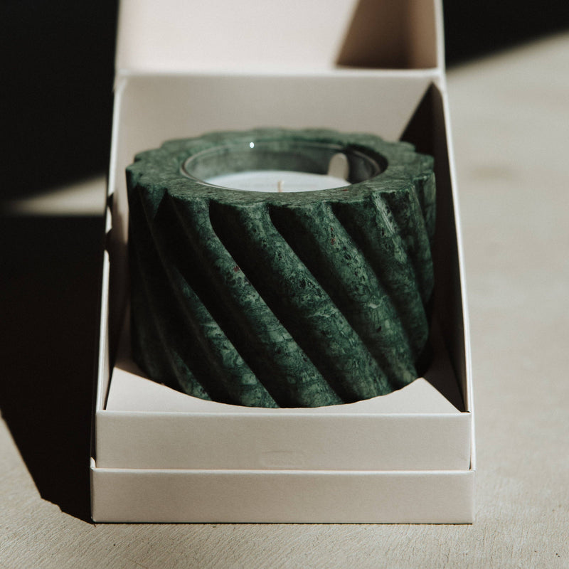 Emerald Green Marble Refillable Candle in a spiral-fluted holder, packaged in a luxurious white box. Unique marble vessel, perfect for elegant kitchen settings.