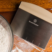 Brod & Taylor | Bench Knife displayed on a kitchen surface, showcasing its ergonomic handle and sharp blade, ideal for precise cutting tasks.