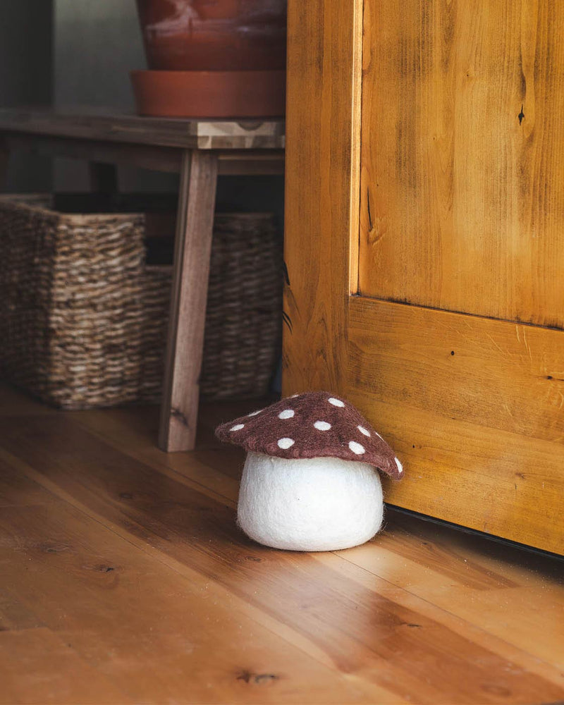 Farmhouse Pottery | Artisan Felted Mushroom Doorstop - Brown, a whimsical, handcrafted wool doorstop, adds rustic charm to your home entryway. Fair trade, made in Nepal.