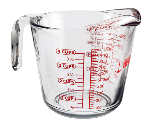 Anchor Hocking measuring cup featuring red text, ideal for precise kitchen measurements. A must-have tool for cooking enthusiasts from Athens Cooks.