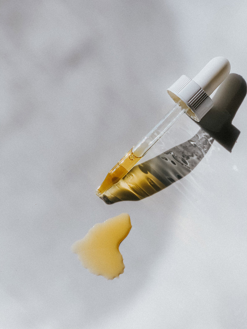 Little Seed Farm | Antioxidant Serum bottle displayed, highlighting its botanical oils and CoQ10 formula for skin protection and revitalization against environmental stressors.