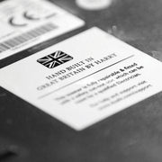 Dualit 2 Slice Classic Toaster with Union-Jack label, highlighting its hand-built, repairable design, lifetime service plan, and energy-efficient features.