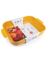 Peugeot | Appolia Rectangular Baking Dish in Saffron Yellow, featuring built-in handles and packaging highlighting its durability and versatility for various cooking methods.