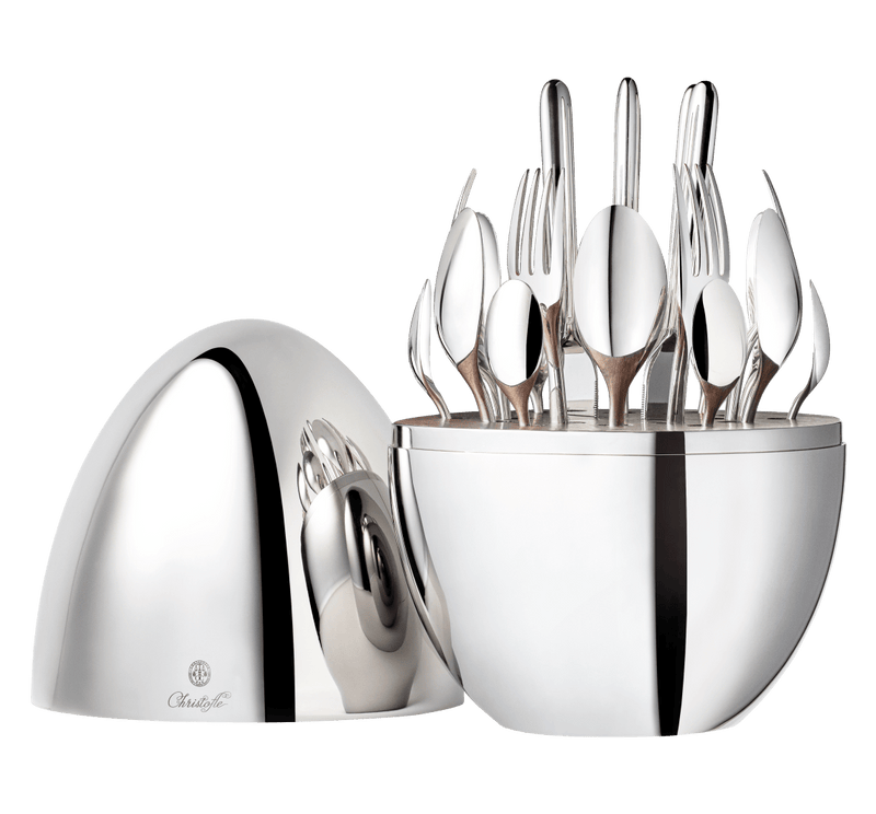 Christofle MOOD BY CHRISTOFLE 24 Pieces: A polished egg-shaped case opens to reveal a 24-piece silver-plated cutlery set, elegantly displayed for stylish dining.