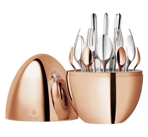 Christofle | MOOD Precious 24 Pieces: Polished egg-shaped case revealing organized cutlery set, featuring silver plate and rose gold finish, elegantly stored and displayed.