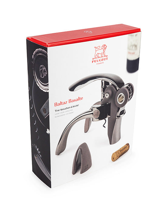 Peugeot | Baltaz Lever Corkscrew with Foil Cutter, Basalt in retail packaging, featuring a large photo of the corkscrew, base piece, cork, and Peugeot logo.
