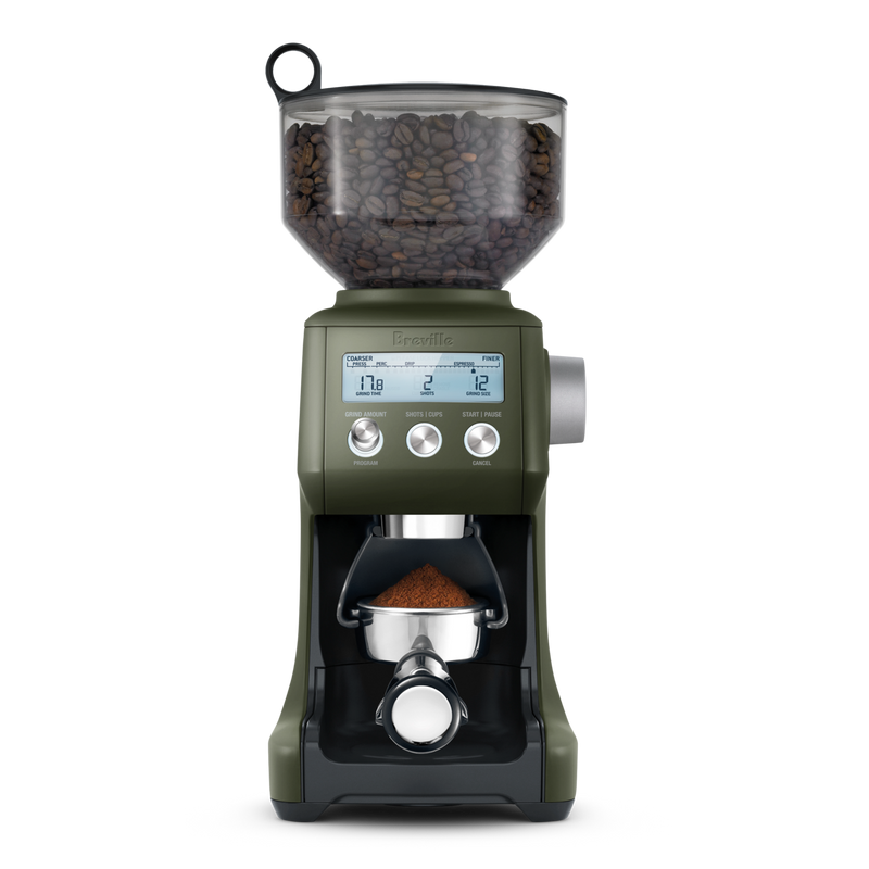 Breville | Smart Grinder Pro with clear hopper of coffee beans and digital controls, dispensing freshly ground coffee into a portafilter below.