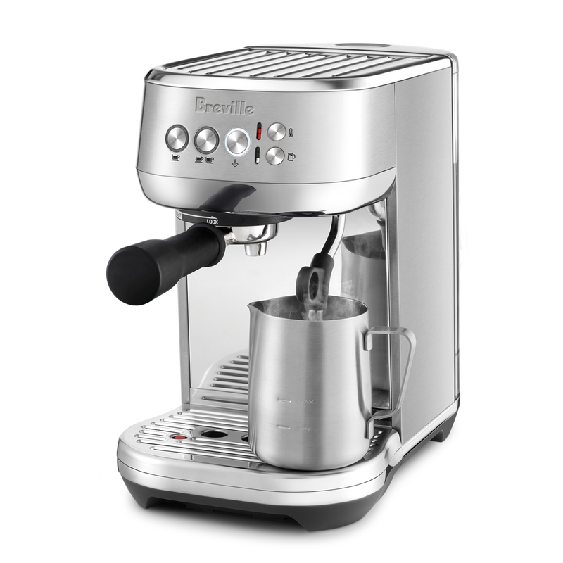 Breville | Bambino Plus espresso machine with portafilter and steam wand in action, ideal for crafting café-quality espresso and microfoam milk at home.