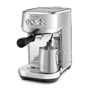 Breville | Bambino Plus espresso machine with portafilter and milk-frothing pitcher, offering professional-grade brewing and microfoam milk capabilities for perfect lattes.