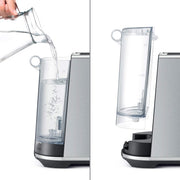 Breville | Bambino Plus espresso machine's removable water reservoir, shown docked and detached, illustrating easy filling and cleaning for optimal coffee preparation.