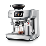 Breville | The Oracle Jet espresso machine with integrated grinder, touchscreen, and steam wand, offering café-style espresso and lattes.