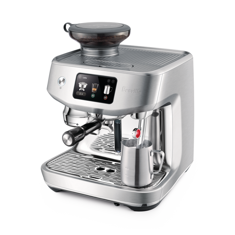 Breville | The Oracle Jet espresso machine, featuring a built-in grinder, digital touchscreen, portafilter, and steam wand with frothing pitcher, ideal for café-quality lattes.