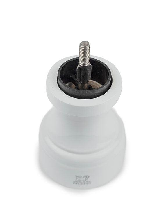 Peugeot | Bistro Pepper Mill, Pearl Grey, showcasing its removable top and exposed ceramic/metal burr mechanism for precise grinding. Perfect for modern soft grey dining settings.