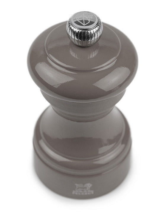 Peugeot | Bistro Salt Mill, Smoked Grey, painted wood with a metal knob, exemplifies French café elegance, crafted in France with a durable steel grinding mechanism.