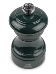 Peugeot | Bistro Pepper Mill, Forest Green: Glossy, dark-green wood pepper grinder with a metal adjustment knob, designed for fine-dining, sustainably sourced from French forests.