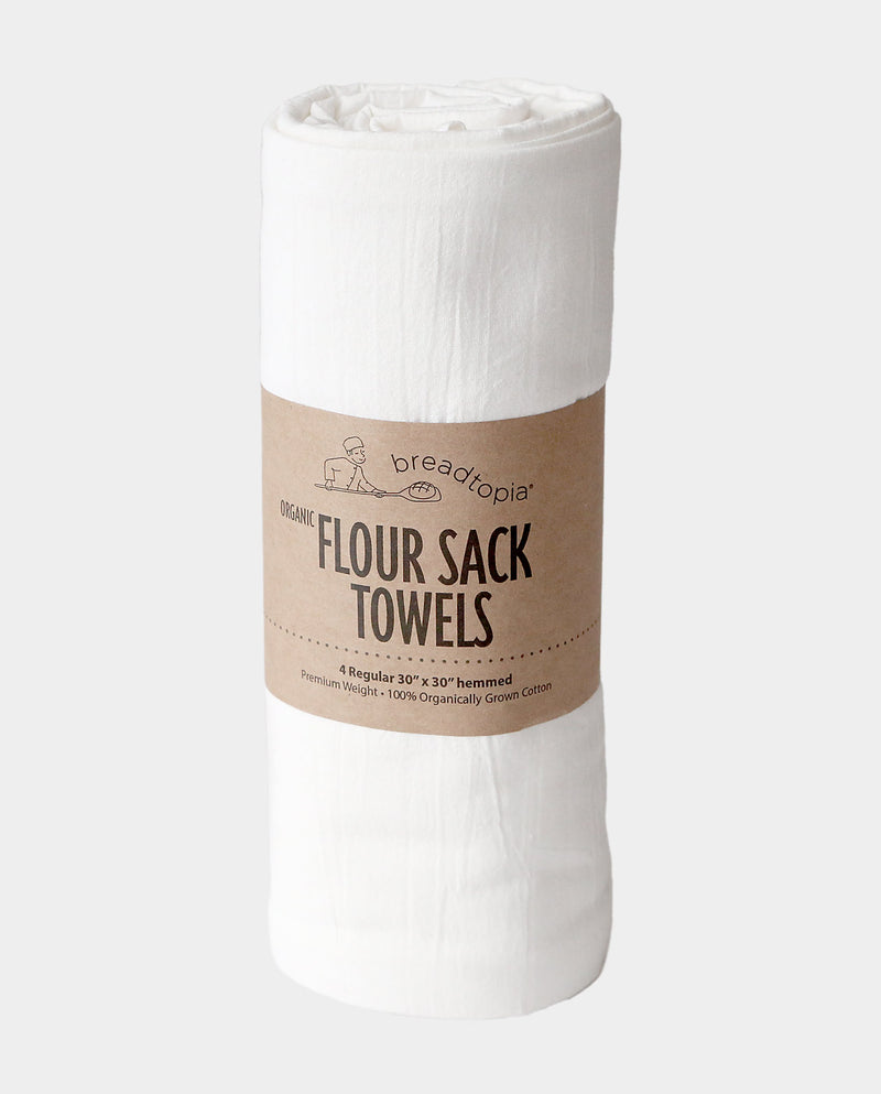 Breadtopia Organic Flour Sack Towels: Four premium, 30 x 30 hemmed towels made from 100% organically grown cotton, wrapped in brown paper. Ideal for versatile kitchen use.