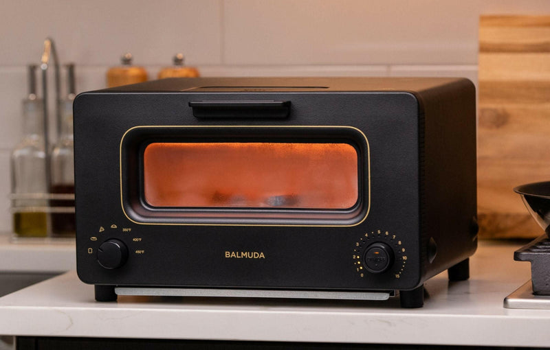 BALMUDA | The Toaster - White, showcasing its innovative steam technology and precise heat control for perfect toasting results, ideal for enhancing culinary creations at home.