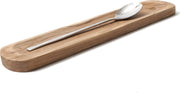 BERARD Spoon Rest 13x3/32x7.5cm Olivewood displayed on a wooden board, highlighting its elegant design as a kitchen utensil available at Athens Cooks.
