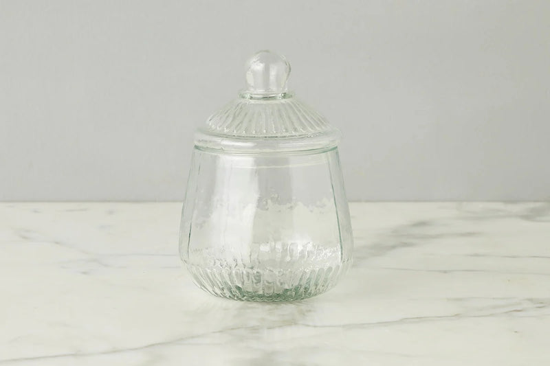 Etú HOME | Bistro Biscuit Jar: A textured glass jar with lid, inspired by 1930s design, perfect for storing confections on a countertop.