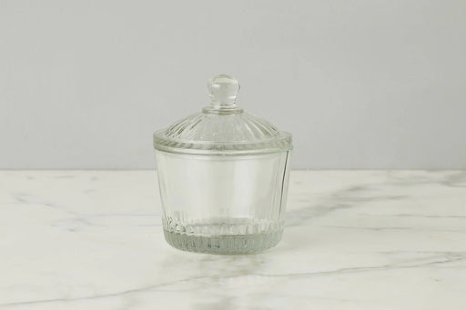 Etú HOME | Bistro Bon Bon Jar, a textured glass container with a lid, inspired by 1930s design, ideal for storing confections on countertops.