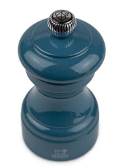 Peugeot | Bistro Pepper Mill in Pacific Blue, featuring a glossy finish and a knurled metal knob, ideal for enhancing pepper flavors in culinary settings.