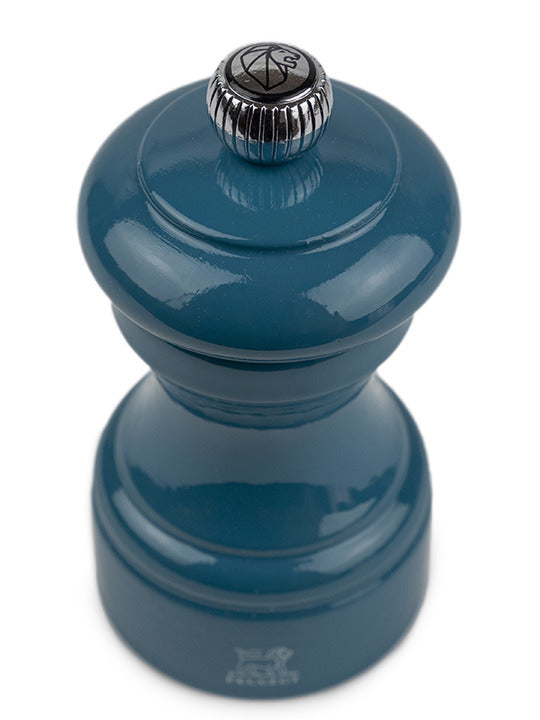 Peugeot | Bistro Pepper Mill in Pacific Blue, featuring a glossy finish and a knurled metal knob, ideal for enhancing pepper flavors in culinary settings.