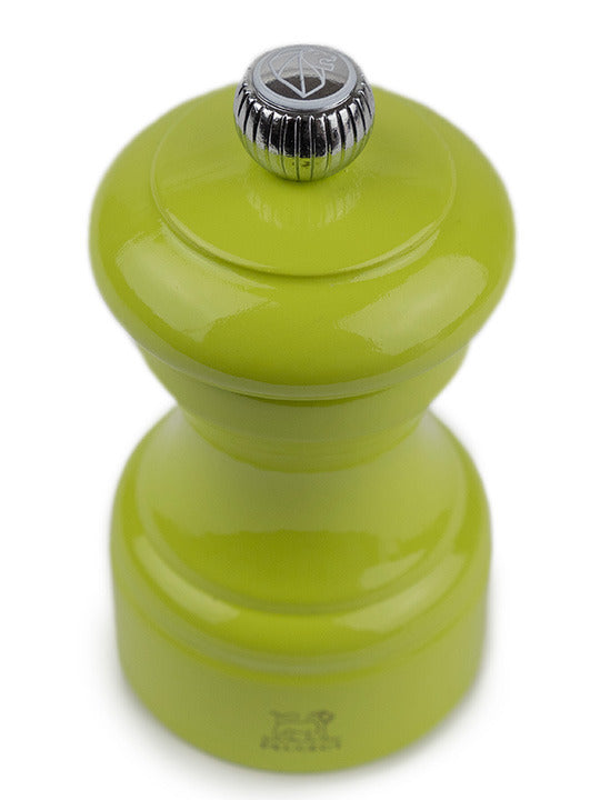 Peugeot | Bistro Salt Mill, Green Pistachio: Glossy lime-green tabletop spice grinder with adjustable coarseness, inspired by classic Peugeot design, ideal for enhancing kitchen experiences.