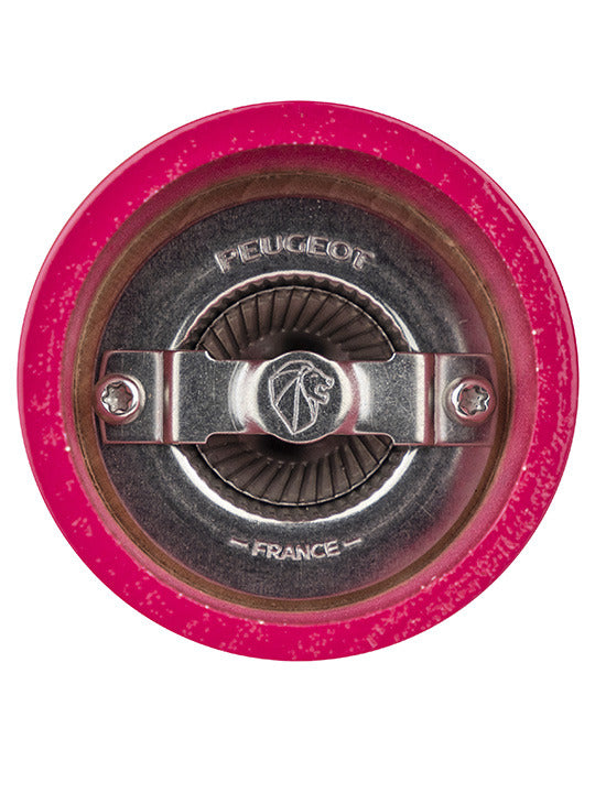 Peugeot | Bistro Salt Mill in candy pink, featuring a durable steel grinding mechanism with “Peugeot” and “France” markings, designed for optimal grip and lifetime use.