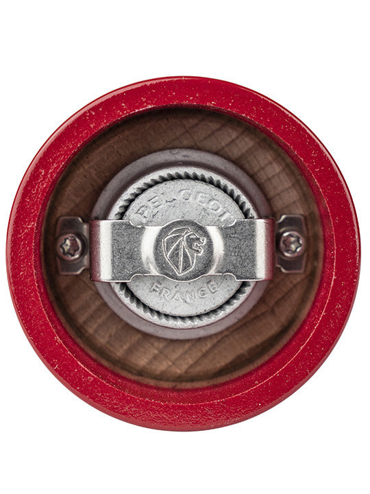 Peugeot | Bistro Pepper Mill, Passion Red, viewed from above, showcasing its iconic grinding mechanism with the Peugeot France lion logo.